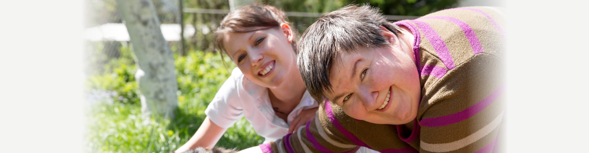 two people smilling